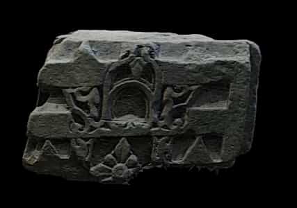 weathered stone carving