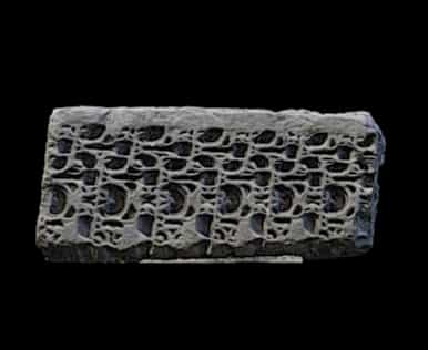 Carved stone panel